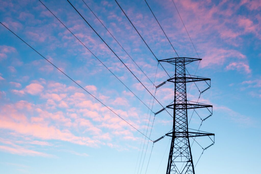 Electrical transmission tower representing the infrastructure managed by electrical contractors, relevant to bookkeeping for electrical contractors.